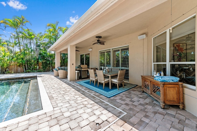 view of patio with a ceiling fan, a fenced in pool, fence, and an outdoor living space