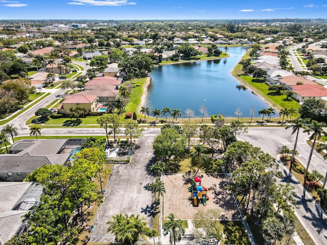 aerial view with a residential view and a water view