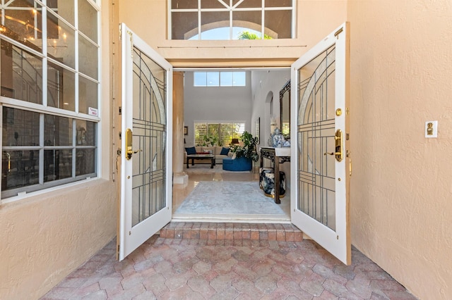 doorway to property featuring french doors