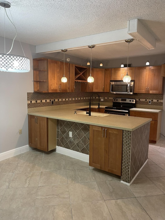 kitchen with brown cabinets, decorative light fixtures, open shelves, stainless steel appliances, and a sink