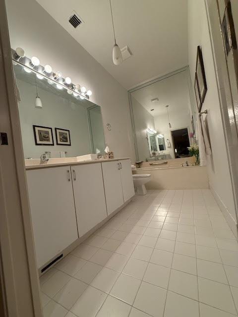 6367 Long Key Ln, Boynton Beach, FL 33472 - bathroom with tile patterned flooring, toilet, and double vanity