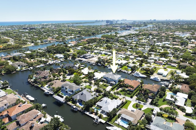 aerial view with a residential view and a water view