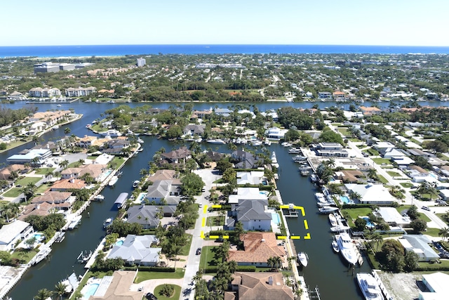 bird's eye view with a water view and a residential view