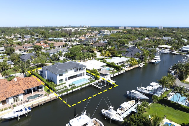 aerial view featuring a residential view and a water view