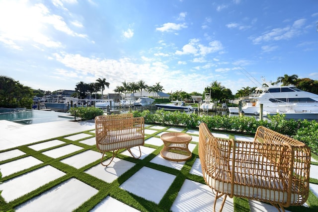 view of patio / terrace featuring a boat dock