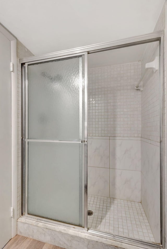 bathroom with a stall shower