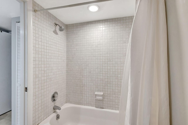 full bathroom with shower / bath combination with curtain