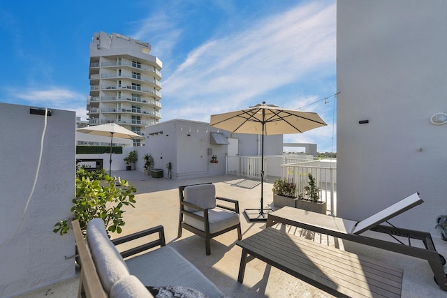 view of patio / terrace featuring a balcony