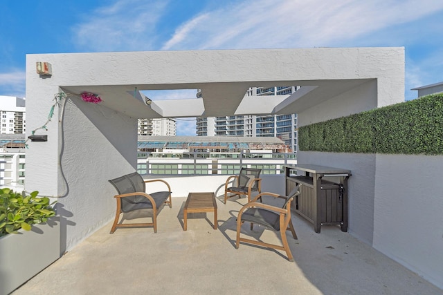 view of patio / terrace with a balcony