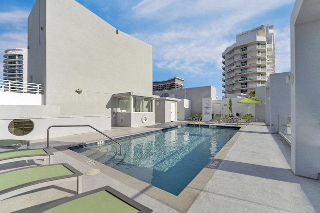 pool with a patio