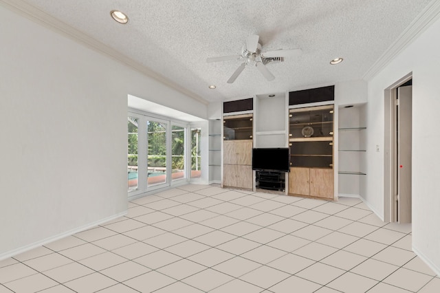 unfurnished living room with a textured ceiling, baseboards, and crown molding