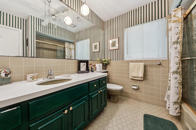 full bath with toilet, wallpapered walls, and tile patterned flooring