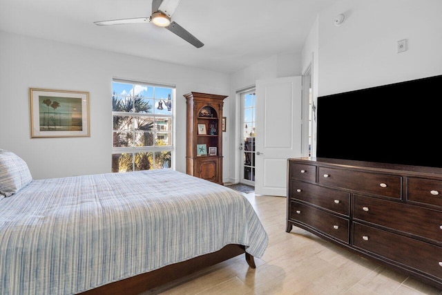 bedroom featuring ceiling fan and light wood finished floors