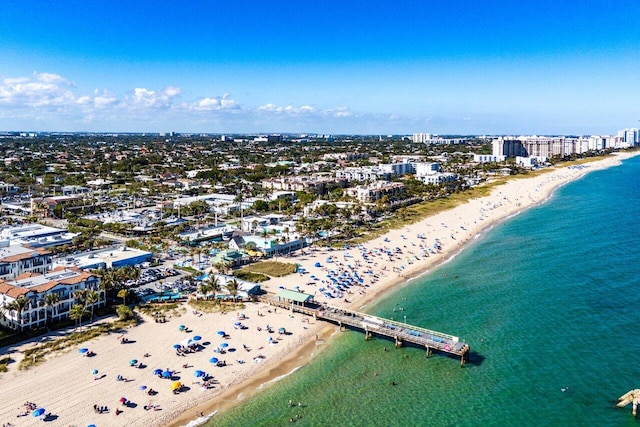 aerial view featuring a view of city, a water view, and a view of the beach