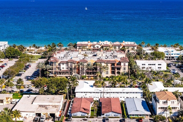 aerial view with a residential view and a water view