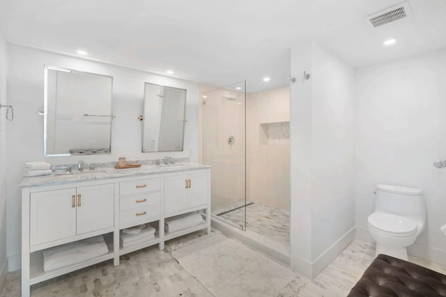 bathroom with toilet, visible vents, walk in shower, and a sink