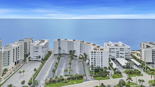 aerial view featuring a water view and a city view