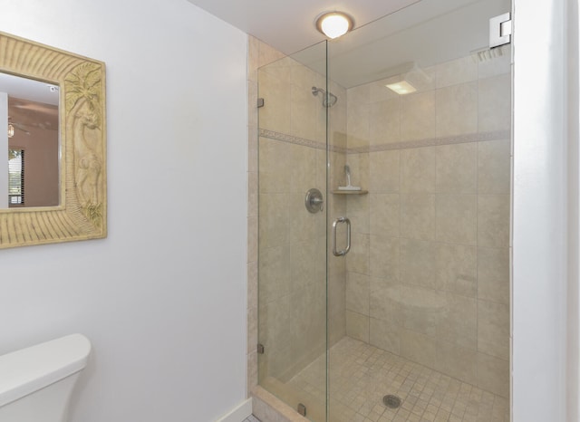 1001 Seafarer Cir Unit 102, Jupiter, FL 33477 - bathroom with a stall shower and toilet