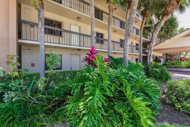 1001 Seafarer Cir Unit 102, Jupiter, FL 33477 - view of apartment building / complex