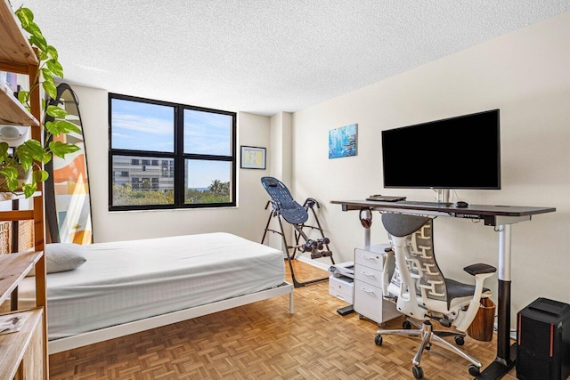 bedroom with a textured ceiling