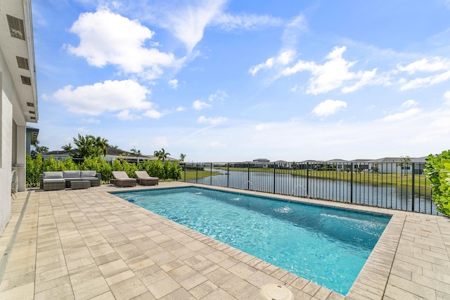 view of pool featuring a fenced in pool, a patio, a water view, an outdoor hangout area, and fence