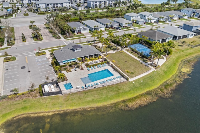 aerial view featuring a water view and a residential view