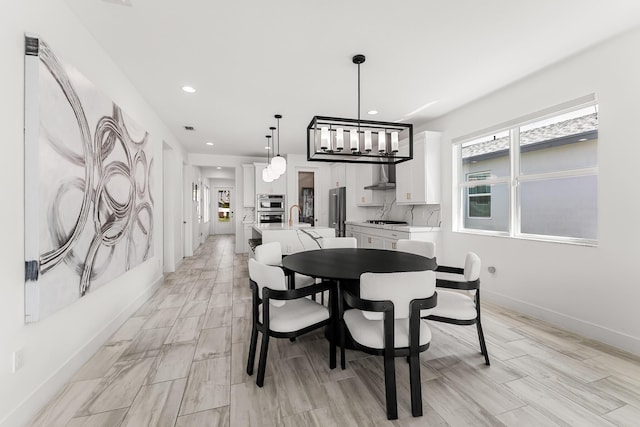 dining space featuring visible vents, baseboards, and recessed lighting