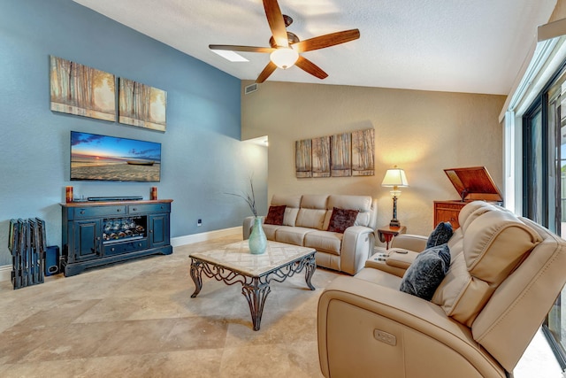 living area featuring visible vents, baseboards, ceiling fan, vaulted ceiling, and a textured ceiling