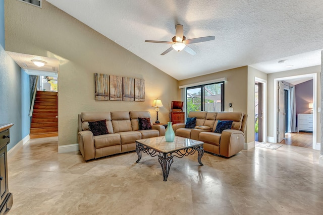 living area featuring vaulted ceiling, stairway, baseboards, and a ceiling fan