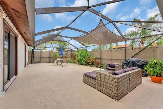 view of patio / terrace with glass enclosure, outdoor dining area, a fenced backyard, area for grilling, and an outdoor living space