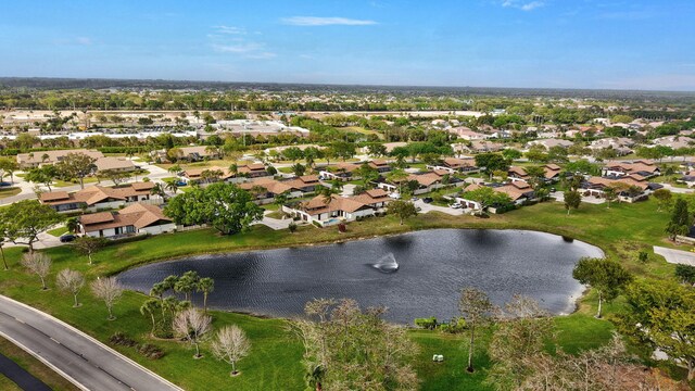 birds eye view of property featuring a water view and a residential view