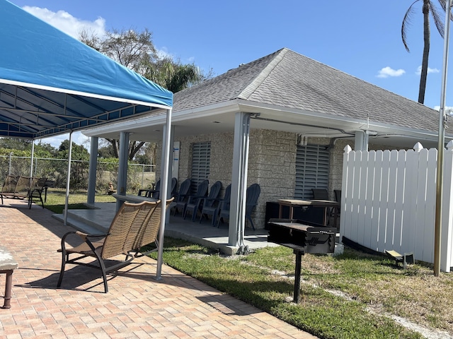 view of patio / terrace with fence