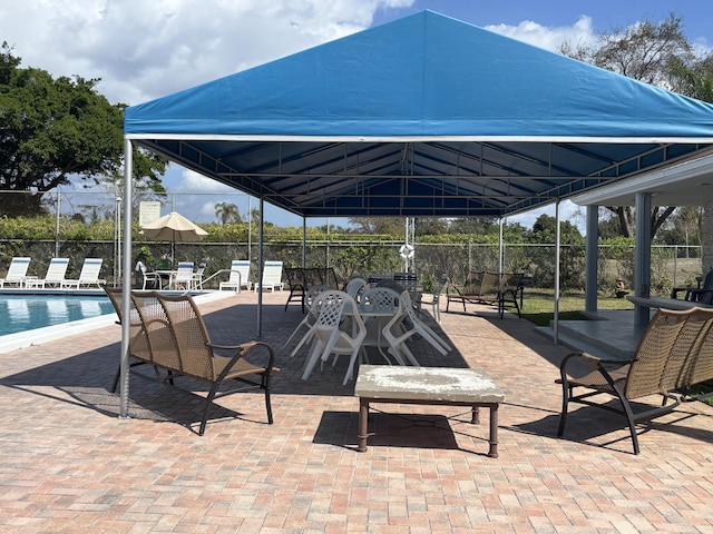 exterior space featuring a patio and fence