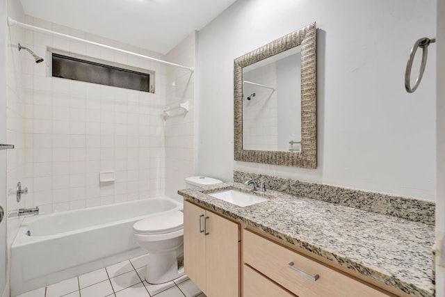 bathroom featuring vanity, shower / tub combination, tile patterned flooring, and toilet