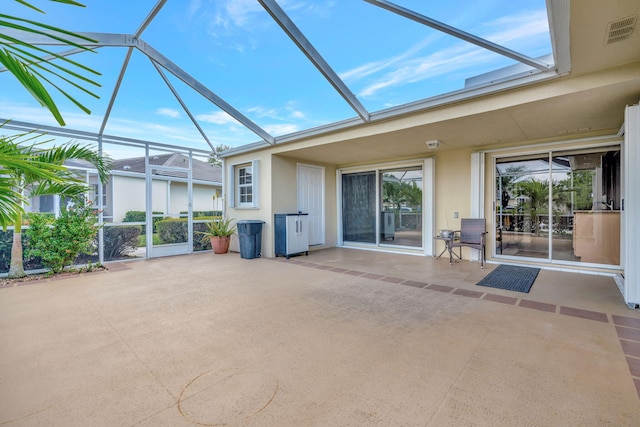 unfurnished sunroom with visible vents