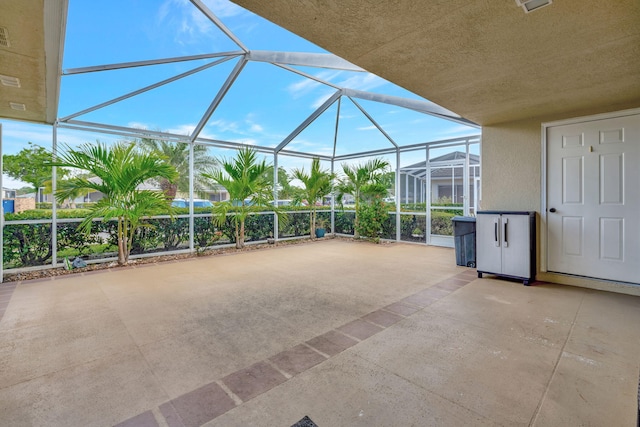 view of patio / terrace with glass enclosure