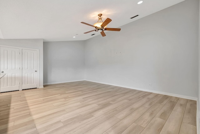 unfurnished room with baseboards, recessed lighting, visible vents, and light wood-style floors