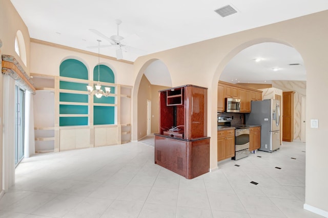 kitchen with visible vents, appliances with stainless steel finishes, open floor plan, backsplash, and ceiling fan with notable chandelier