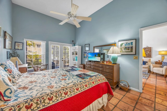 tiled bedroom featuring ceiling fan, high vaulted ceiling, baseboards, access to outside, and french doors