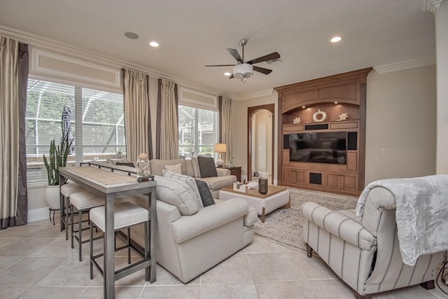 living room featuring recessed lighting, light tile patterned floors, crown molding, and a ceiling fan