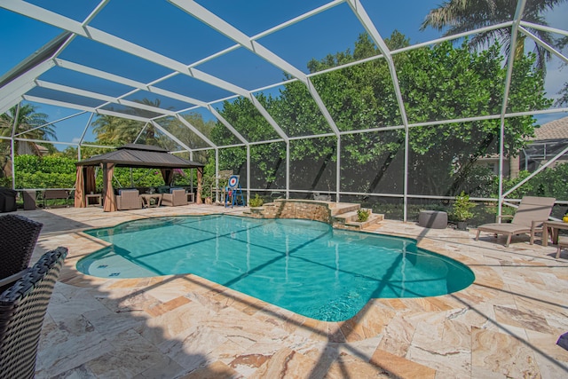 pool featuring a patio area, outdoor lounge area, a gazebo, and a lanai