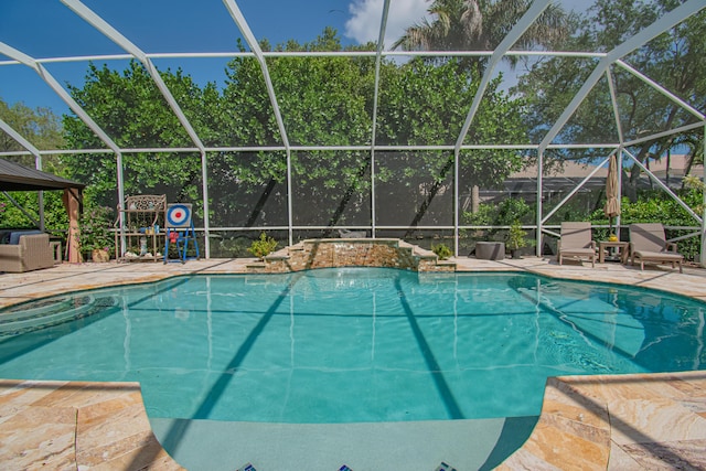 pool with a lanai and a patio
