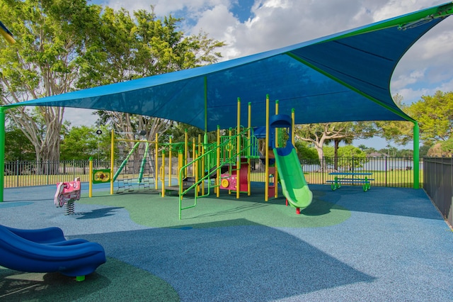 community jungle gym with fence