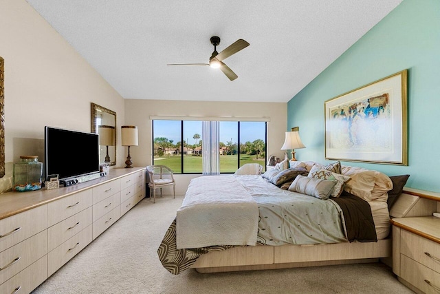 7290 Clunie Pl Unit 14404, Delray Beach, FL 33446 - bedroom with access to outside, light colored carpet, lofted ceiling, ceiling fan, and a textured ceiling