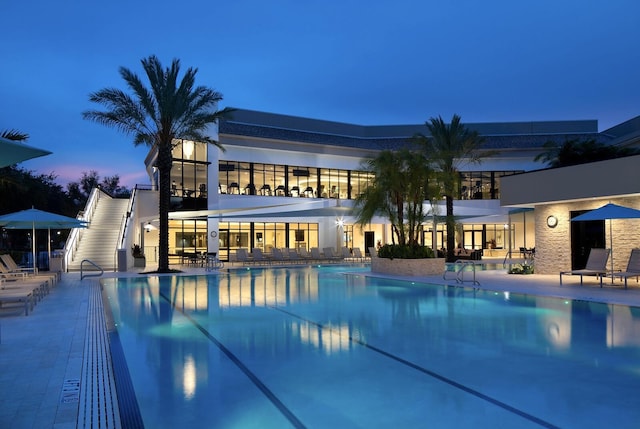 pool with a patio area