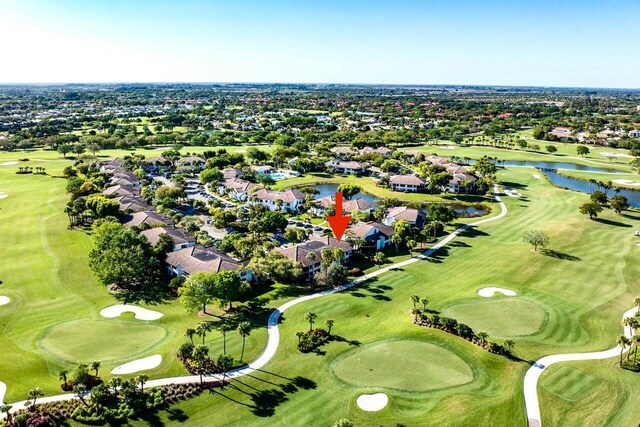 7290 Clunie Pl Unit 14404, Delray Beach, FL 33446 - aerial perspective of suburban area featuring a large body of water and a golf club