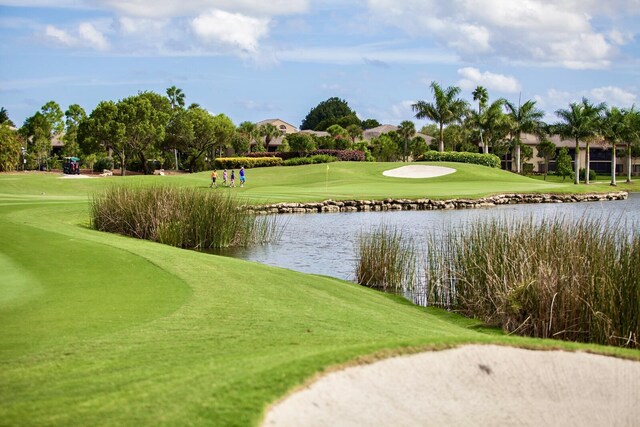 7290 Clunie Pl Unit 14404, Delray Beach, FL 33446 - view of property's community featuring a water view, view of golf course, and a yard