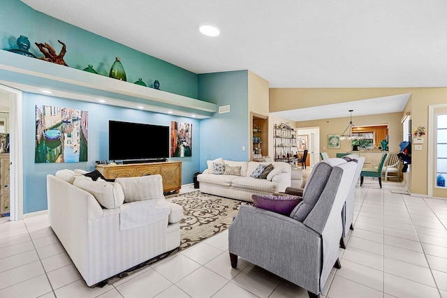 living room featuring light tile patterned floors, baseboards, lofted ceiling, and recessed lighting