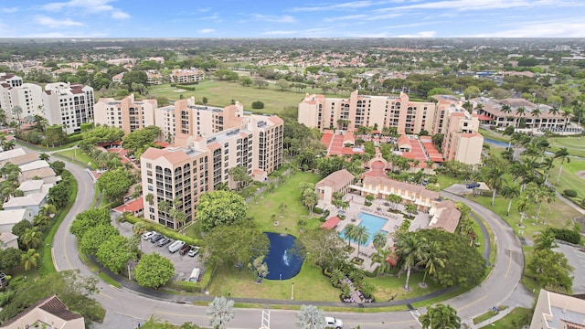 birds eye view of property with a view of city