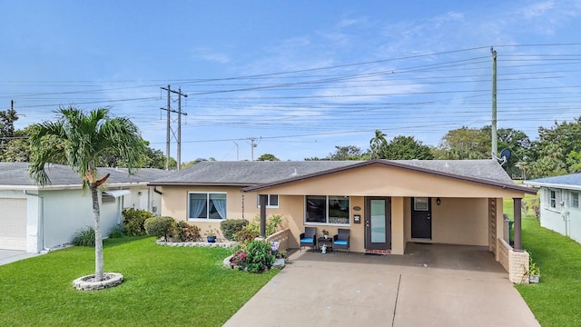 single story home with stucco siding, concrete driveway, and a front lawn